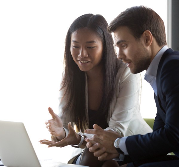 man and woman reviewing having discussion