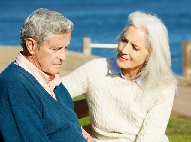 family sitting on a patio