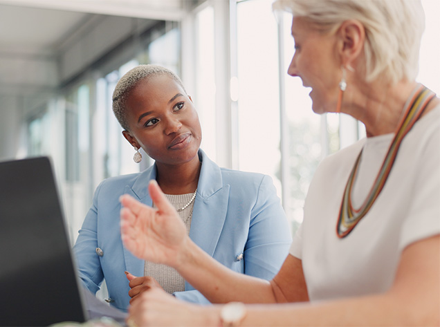 Two women at laptop