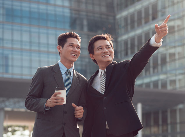 men outside a building